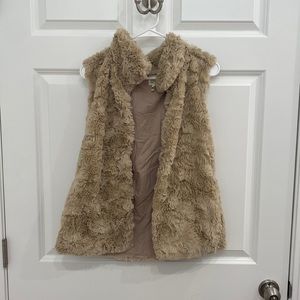 Tan faux fur vest. Size large.